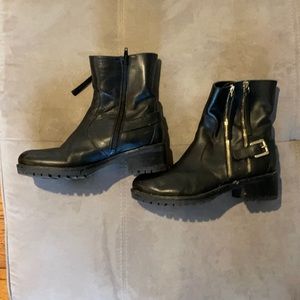 Black zip up waffle sole minelli boots.